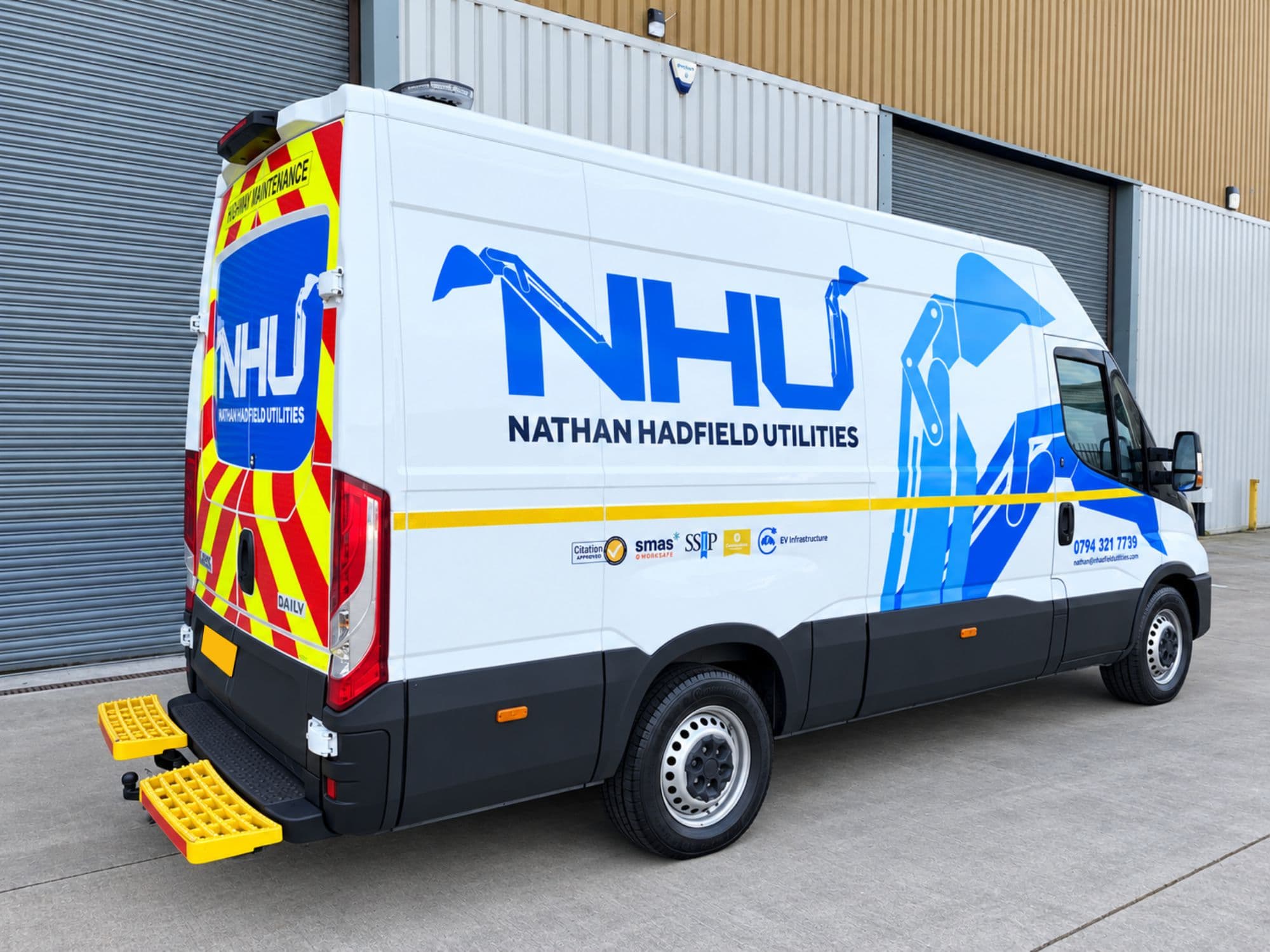 van graphics and chevron kit on white van